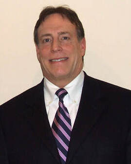 Doctor Mark Pernokas smiling
